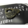 Eerie Owl Planchette on Ouija Board